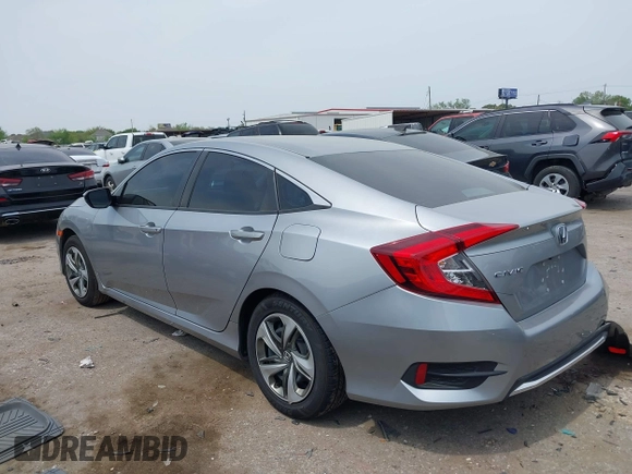 2019 Honda Civic LX with VIN 19XFC2F66KE026931, listed as a IAAI auction lot 41885137 with 55,057 mi miles and . Bid and sale history available at DreamBid. Image 3.