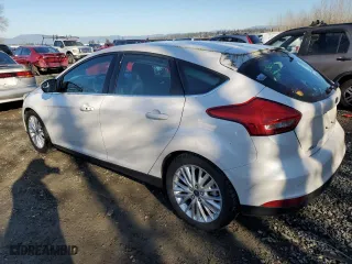 2015 Ford Focus Titanium with VIN 1FADP3N25FL325037, listed as a Copart auction lot 42248985 with 58,831 mi miles and Salvage Title. Bid and sale history available at carsss.com. Image 2.