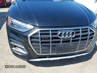 2021 Audi Q5 Premium Plus z VIN WA1BAAFY7M2114476, wystawiony jako IAAI lot #42063790 z przebiegiem 44 945 mil mil oraz . Historia ofert i sprzedaży dostępna na DreamBid. Obrazek 17.