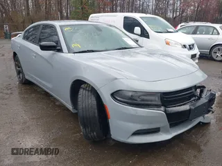 2020 Dodge Charger SXT with VIN 2C3CDXBG6LH234541, listed as a IAAI auction lot 41853444 with 119,582 mi miles. Bid and sale history available at carsss.com. Image 1.