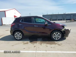2018 Buick Encore Preferred with VIN KL4CJASB7JB572715, listed as a IAAI auction lot 41851839 with 97,797 mi miles and . Bid and sale history available at DreamBid. Image 14.