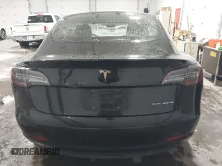 2018 Tesla Model 3 Long Range Battery with VIN 5YJ3E1EB7JF086778, listed as a IAAI auction lot 41348008 with 74,491 mi miles and . Bid and sale history available at DreamBid. Image 16.