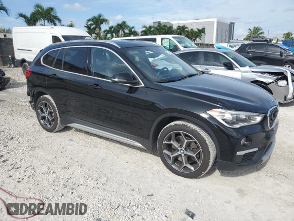 2019 BMW X1 xDrive28i with VIN WBXHT3C59K5L36435, listed as a Copart auction lot 60189985 with 105,110 mi miles and Salvage title. Bid and sale history available at DreamBid. Image 4.