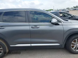 2020 Hyundai Santa Fe SE z VIN 5NMS23AD3LH155930, wystawiony jako IAAI lot #42155889 z przebiegiem 64 441 mil mil oraz . Historia ofert i sprzedaży dostępna na DreamBid. Obrazek 14.