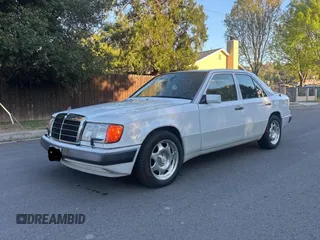 1992 Mercedes-Benz 400 with VIN WDBEA34E4NB705887, listed as a Copart auction lot 48637485 with 76,661 mi miles and Clean Title. Bid and sale history available at carsss.com. Image 2.