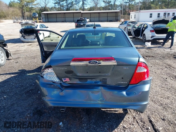 2011 Ford Fusion SEL with VIN 3FAHP0JG9BR131298, listed as a IAAI auction lot 41747976 with 169,000 mi miles. Bid and sale history available at carsss.com. Image 6.