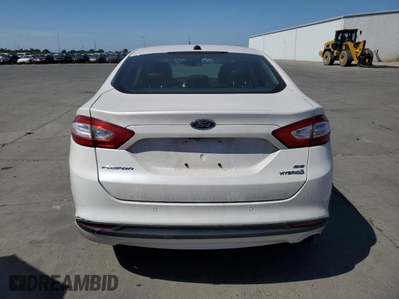 2013 Ford Fusion SE Hybrid z VIN 3FA6P0LU6DR325719, wystawiony jako Copart lot #55777715 z przebiegiem 152 478 mil mil oraz Szkoda całkowita • Salvage title. Historia ofert i sprzedaży dostępna na DreamBid. Obrazek 6.