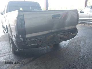 2014 Toyota Tacoma with VIN 3TMMU4FN4EM072128, listed as a IAAI auction lot 42479725 with 287,877 mi miles and . Bid and sale history available at DreamBid. Image 6.
