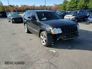 2008 Jeep Grand Cherokee SRT-8 with VIN 1J8HR78368C152318, listed as a Copart auction lot 74203604 with 157,840 mi miles and Salvage Title. Bid and sale history available at carsss.com. Image 12.