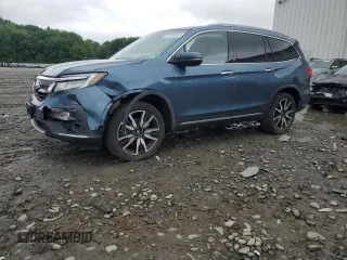 2020 Honda Pilot Elite with VIN 5FNYF6H01LB026931, listed as a Copart auction lot 61128365 with 83,314 mi miles and Salvage title. Bid and sale history available at DreamBid. Image 1.
