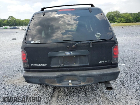 2000 Ford Explorer Sport with VIN 1FMYU60E8YUB03494, listed as a Copart auction lot 59266395 with 210,925 mi miles and Salvage title. Bid and sale history available at DreamBid. Image 6.