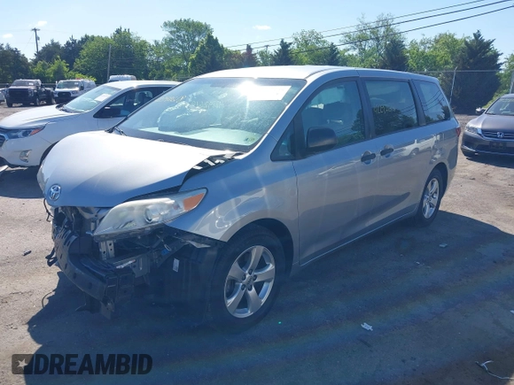 2015 Toyota Sienna L with VIN 5TDZK3DCXFS594786, listed as a IAAI auction lot 42292618 with 180,119 mi miles and . Bid and sale history available at DreamBid. Image 2.