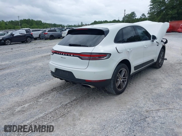 2021 Porsche Macan with VIN WP1AA2A52MLB06086, listed as a IAAI auction lot 39423611 with 56,559 mi miles and . Bid and sale history available at DreamBid. Image 4.