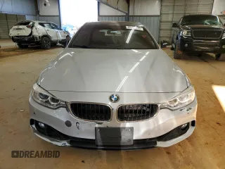 2015 BMW 4 Series 428i z VIN WBA4A5C51FG052009, wystawiony jako Copart lot #89110235 z przebiegiem 156 675 mil mil oraz Szkoda całkowita • Salvage title. Historia ofert i sprzedaży dostępna na DreamBid. Obrazek 5.