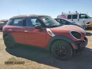 2014 MINI Countryman with VIN WMWZB3C5XEWR42035, listed as a Copart auction lot 61846725 with 105,131 mi miles and Salvage title. Bid and sale history available at DreamBid. Image 4.
