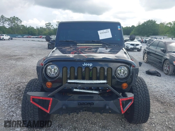 2012 Jeep Wrangler Sport z VIN 1C4AJWAG2CL286680, wystawiony jako IAAI lot #42434411 z przebiegiem 97 142 mil mil oraz . Historia ofert i sprzedaży dostępna na DreamBid. Obrazek 12.