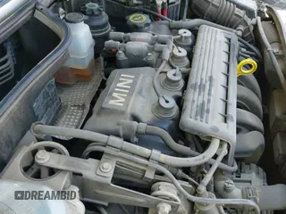 2003 MINI Hardtop with VIN WMWRC33403TC38853, listed as a IAAI auction lot 42427825 with 111,526 mi miles and . Bid and sale history available at DreamBid. Image 20.