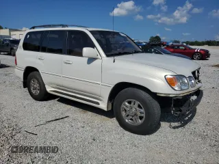 1999 Lexus LX 470 z VIN JT6HT00W1X0074382, wystawiony jako Copart lot #53612205 z przebiegiem 256 689 mil mil oraz Szkoda całkowita • Salvage title. Historia ofert i sprzedaży dostępna na DreamBid. Obrazek 4.