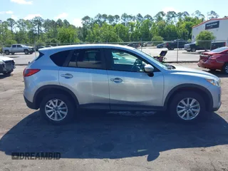 2016 Mazda CX-5 Touring z VIN JM3KE4CY4G0646114, wystawiony jako IAAI lot #42269181 z przebiegiem 58 252 mil mil oraz . Historia ofert i sprzedaży dostępna na DreamBid. Obrazek 14.