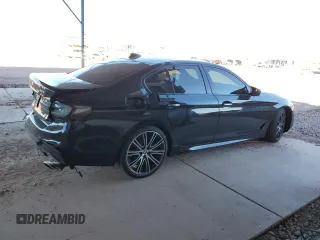 2018 BMW 5 Series 540i xDrive with VIN WBAJE7C5XJWD52054, listed as a Copart auction lot 47306535 with 49,185 mi miles and Salvage title. Bid and sale history available at DreamBid. Image 3.