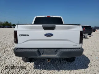 2015 Ford F-150 XLT w/HD Payload Pkg with VIN 1FTFW1EG6FFA02457, listed as a Copart auction lot 52121515 with 242,747 mi miles and Salvage Title. Bid and sale history available at carsss.com. Image 6.