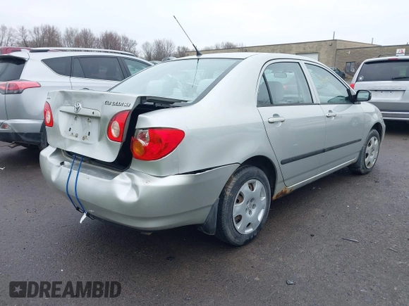 2003 Toyota Corolla CE with VIN 2T1BR32E13C051798, listed as a IAAI auction lot 42009353 with 153,941 mi miles and . Bid and sale history available at DreamBid. Image 4.