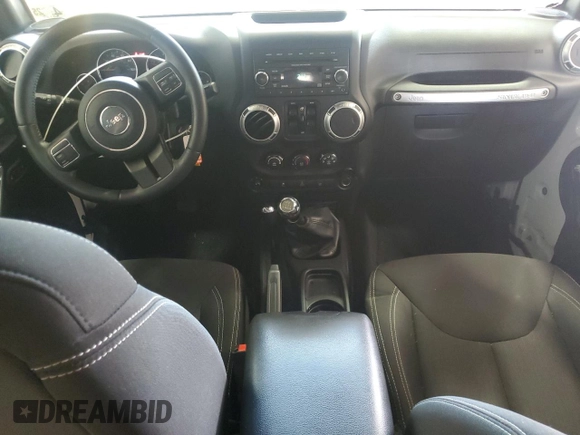2016 Jeep Wrangler Unlimited Sahara with VIN 1C4BJWEGXGL310499, listed as a Copart auction lot 59756015 with 128,498 mi miles and Salvage title. Bid and sale history available at DreamBid. Image 8.