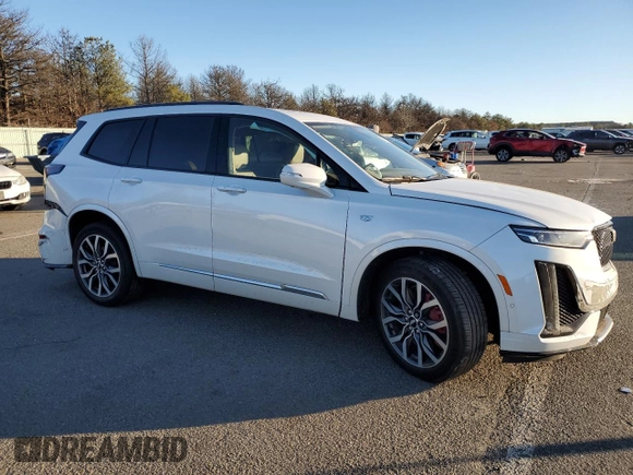 2022 Cadillac XT6 Sport with VIN 1GYKPHRS1NZ131085, listed as a Copart auction lot 87600915 with 23,251 mi miles and Salvage Title. Bid and sale history available at carsss.com. Image 4.