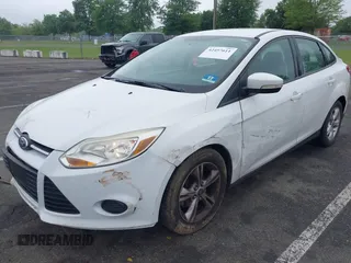 2013 Ford Focus SE with VIN 1FADP3F29DL306051, listed as a IAAI auction lot 42457611 with 86,817 mi miles and . Bid and sale history available at DreamBid. Image 2.