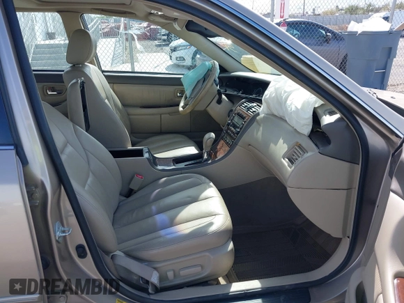 2002 Toyota Avalon XL with VIN 4T1BF28B42U264581, listed as a IAAI auction lot 42034260 with 155,296 mi miles and . Bid and sale history available at DreamBid. Image 5.
