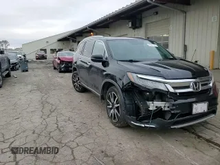 2019 Honda Pilot Touring 7-Passenger with VIN 5FNYF6H60KB008908, listed as a Copart auction lot 84081174 with 93,200 mi miles and Clean Title. Bid and sale history available at DreamBid. Image 12.