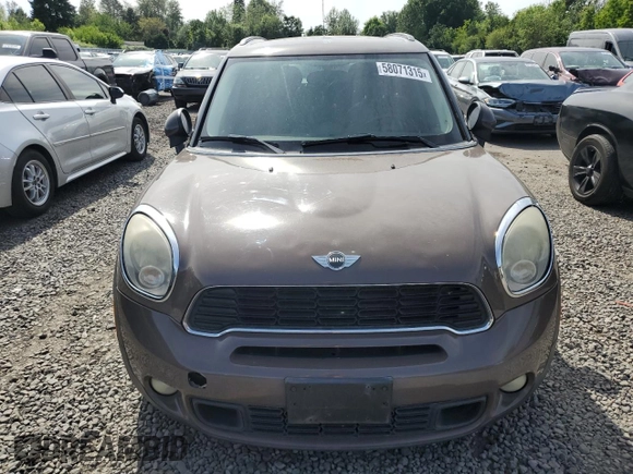 2011 MINI Countryman S with VIN WMWZC3C56BWH97944, listed as a Copart auction lot 58071315 with 176,528 mi miles and Clean title. Bid and sale history available at DreamBid. Image 5.