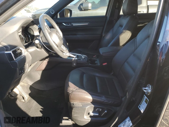 2023 Mazda CX-5 Signature with VIN JM3KFBXY1P0122544, listed as a Copart auction lot 83712034 with 27,032 mi miles and Salvage Title. Bid and sale history available at DreamBid. Image 7.