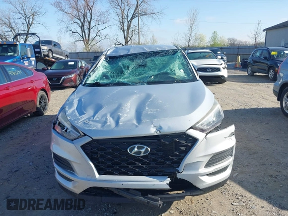 2019 Hyundai Tucson SE with VIN KM8J2CA48KU872175, listed as a IAAI auction lot 41956066 with 105,534 mi miles. Bid and sale history available at carsss.com. Image 12.