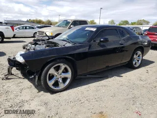 2012 Dodge Challenger SXT Plus with VIN 2C3CDYAG8CH173961, listed as a Copart auction lot 50959275 with 136,639 mi miles and Salvage Title. Bid and sale history available at carsss.com. Image 1.