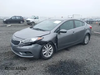2014 Kia Forte EX with VIN KNAFX4A8XE5213014, listed as a IAAI auction lot 41000589 with 89,890 mi miles. Bid and sale history available at carsss.com. Image 17.