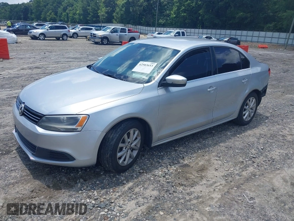 2014 Volkswagen Jetta SE with VIN 3VWD07AJ6EM240396, listed as a IAAI auction lot 42503653 with 146,920 mi miles and . Bid and sale history available at DreamBid. Image 2.