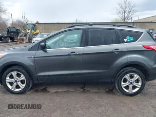 2016 Ford Escape SE with VIN 1FMCU9G92GUC22029, listed as a IAAI auction lot 42032478 with 133,853 mi miles. Bid and sale history available at carsss.com. Image 14.