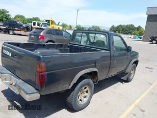 1991 Nissan Frontier XE with VIN 1N6SD11YXMC416937, listed as a IAAI auction lot 42660772 with 310,699 mi miles and . Bid and sale history available at DreamBid. Image 4.