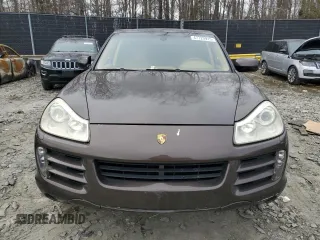 2009 Porsche Cayenne z VIN WP1AA29P79LA04909, wystawiony jako Copart lot #47720915 z przebiegiem 208 619 mil mil oraz Szkody całkowita. Historia ofert i sprzedaży dostępna na DreamBid. Obrazek 5.