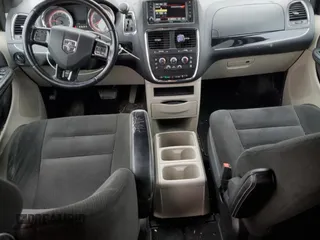 2017 Dodge Grand Caravan SE Plus with VIN 2C4RDGBG6HR567880, listed as a Copart auction lot 52562345 with 138,243 mi miles and Salvage Title. Bid and sale history available at DreamBid. Image 8.