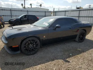2021 Dodge Challenger R/T Scat Pack Widebody z VIN 2C3CDZFJ7MH502550, wystawiony jako Copart lot #52814305 z przebiegiem 75 781 mil mil oraz Szkoda całkowita • Salvage title. Historia ofert i sprzedaży dostępna na DreamBid. Obrazek 1.