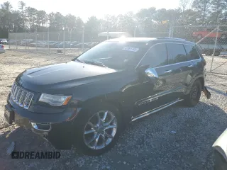 2015 Jeep Grand Cherokee Summit with VIN 1C4RJFJG0FC700014, listed as a Copart auction lot 42981765 with 144,937 mi miles and Salvage Title. Bid and sale history available at DreamBid. Image 1.
