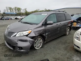 2015 Toyota Sienna XLE with VIN 5TDYK3DC6FS660035, listed as a Copart auction lot 51660075 with 176,968 mi miles and Salvage Title. Bid and sale history available at DreamBid. Image 1.