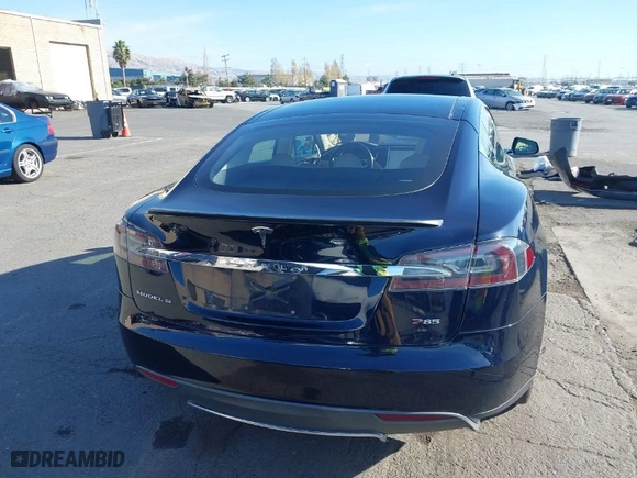 2013 Tesla Model S Performance with VIN 5YJSA1DP5DFP17035, listed as a IAAI auction lot 40895661 with 137,283 mi miles. Bid and sale history available at carsss.com. Image 16.
