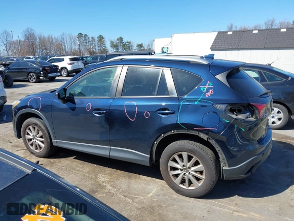 2016 Mazda CX-5 Touring with VIN JM3KE4CY0G0631786, listed as a IAAI auction lot 41761214 with 220,058 mi miles. Bid and sale history available at carsss.com. Image 14.