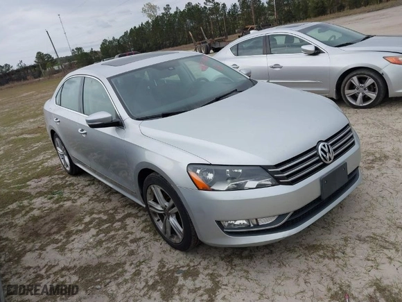 2015 Volkswagen Passat 1.8T SE w/Sunroof & Nav with VIN 1VWBT7A38FC019255, listed as a IAAI auction lot 41872887 with 121,845 mi miles. Bid and sale history available at carsss.com. Image 1.