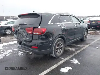 2019 Kia Sorento EX with VIN 5XYPHDA57KG452677, listed as a IAAI auction lot 41362615 with 100,580 mi miles and . Bid and sale history available at DreamBid. Image 4.