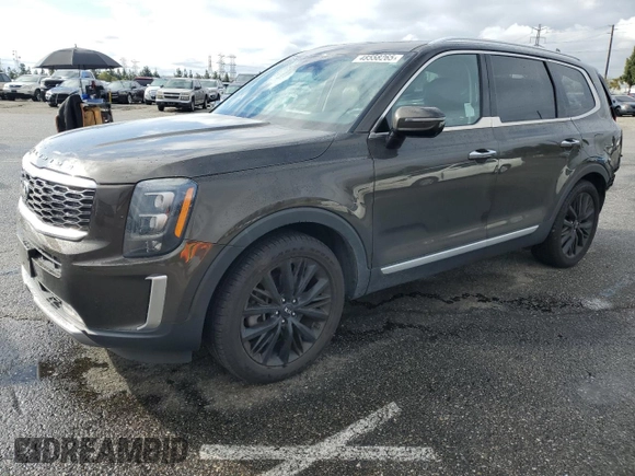 2021 Kia Telluride SX with VIN 5XYP54HC7MG191227, listed as a Copart auction lot 48558265 with 71,416 mi miles and Salvage Title. Bid and sale history available at DreamBid. Image 1.