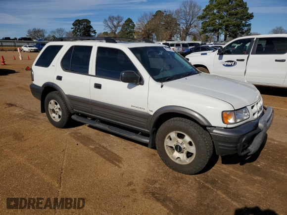 2001 Isuzu Rodeo S with VIN 4S2DM58W114343183, listed as a Copart auction lot 88128465 with 85,926 mi miles and Salvage Title. Bid and sale history available at DreamBid. Image 4.